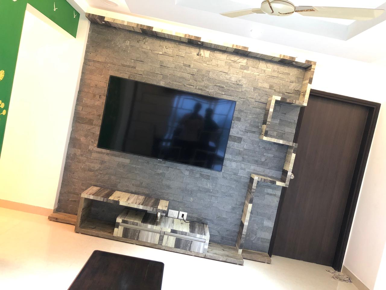 Calypso Full-Length Entertainment Unit with a Tall Storage Unit